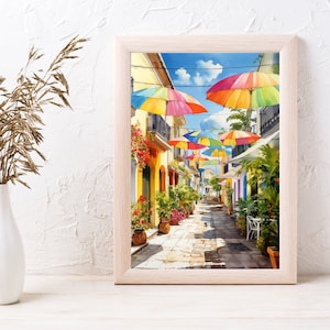 May include: A watercolour painting of a colourful street scene with a row of brightly coloured umbrellas lining the street. The umbrellas are red, yellow, blue, green, and orange. The street is lined with buildings and trees.
