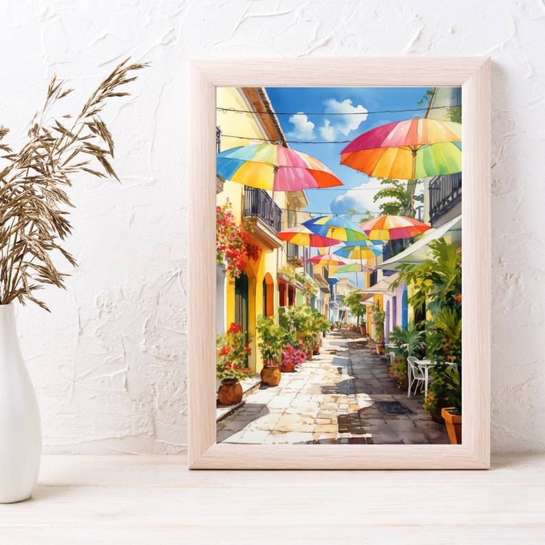 May include: A watercolour painting of a colourful street scene with a row of brightly coloured umbrellas lining the street. The umbrellas are red, yellow, blue, green, and orange. The street is lined with buildings and trees.