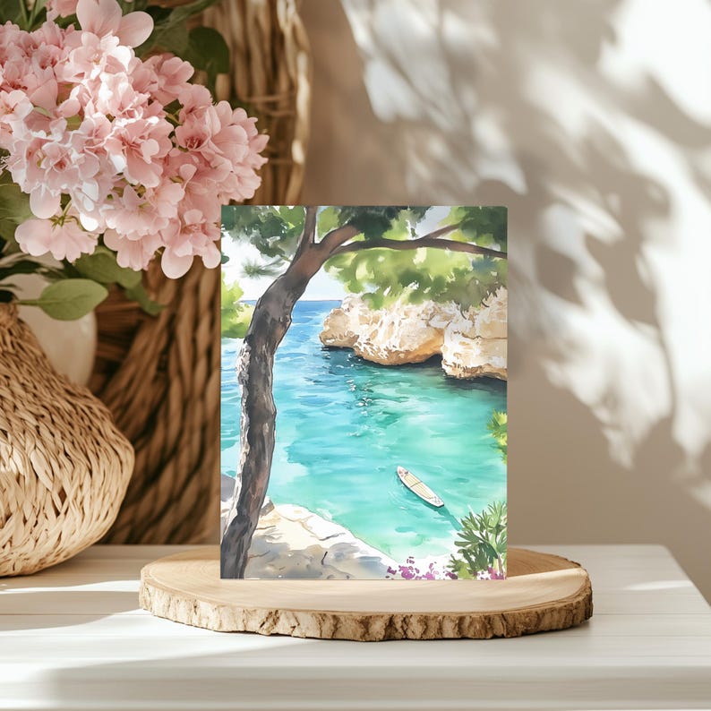 May include: Watercolor painting of a serene coastal scene. Turquoise water meets rocky cliffs and lush greenery under a blue sky. A small boat floats in the water. The artwork is displayed on a wooden slice.