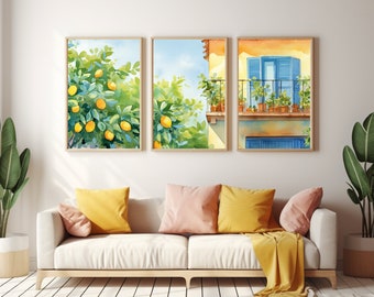 May include: A set of three framed watercolor prints displayed on a wall. The artwork depicts a vibrant lemon tree with yellow fruit, a sunny Mediterranean balcony with potted plants, and a building facade featuring bright blue shutters and foliage.