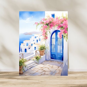 May include: A watercolor painting depicting a white building with a bright blue arched door and pink bougainvillea flowers. The scene includes a stone patio, potted green plants, and a view of white houses overlooking a blue sea and sky.