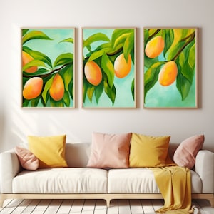 May include: Three framed prints of a painting of a branch of a tree with green leaves and orange fruit. The background is a light blue.