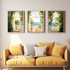 May include: Three framed watercolor paintings of windows with views of the ocean and lemon trees. The windows are open and the ocean is visible in the distance. The lemon trees are in pots and have green leaves and yellow lemons.