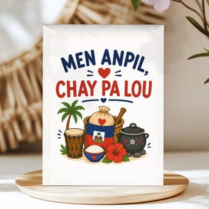 May include: A rectangular print featuring the text MEN ANPIL, CHAY PA LOU in blue and red. The illustration includes a palm tree, a drum, a basket with the Haitian flag, a bowl of white rice, a black cooking pot, and a red hibiscus flower.
