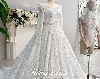 Vestido de novia de lujo estilo princesa con perlas, falda de tul con cuentas, alta costura nupcial a medida.