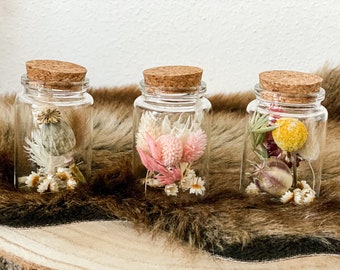 Dried flowers - posy in a glass dry flowers in different colors, bouquet of dried flowers