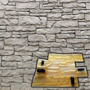 Puede incluir: Un conjunto de tres moldes de goma marrón para crear un patrón de pared de piedra. Los moldes están hechos de goma flexible y tienen una superficie texturizada. Los moldes están diseñados para ser utilizados con hormigón u otros materiales de fundición.