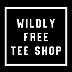 May include: A black square with a white border contains the text "WILDLY FREE TEE SHOP" in bold, sans-serif font. The text is centered and stacked vertically, creating a clean and modern design.