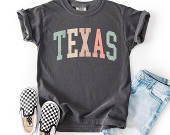 Flicktröja i pastellfärgad Texas, barntröja i Texas, barntröja i komfortfärger® för Texas, barntröja med matchdagsmotiv, presenter till Texas, ungdomströja för flickor i Texas