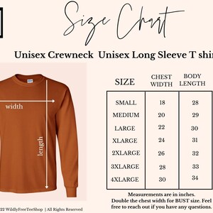 May include: A rust-colored long-sleeve unisex crewneck t-shirt with a size chart. The chart lists chest width and body length measurements in inches for sizes small through 4XL. The shirt has a width and length measurement graphic.