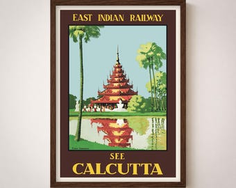 May include: A framed vintage travel poster for the East Indian Railway, promoting Calcutta. The artwork features a red and gold pagoda reflected in a lake, with palm trees and the text "SEE CALCUTTA".