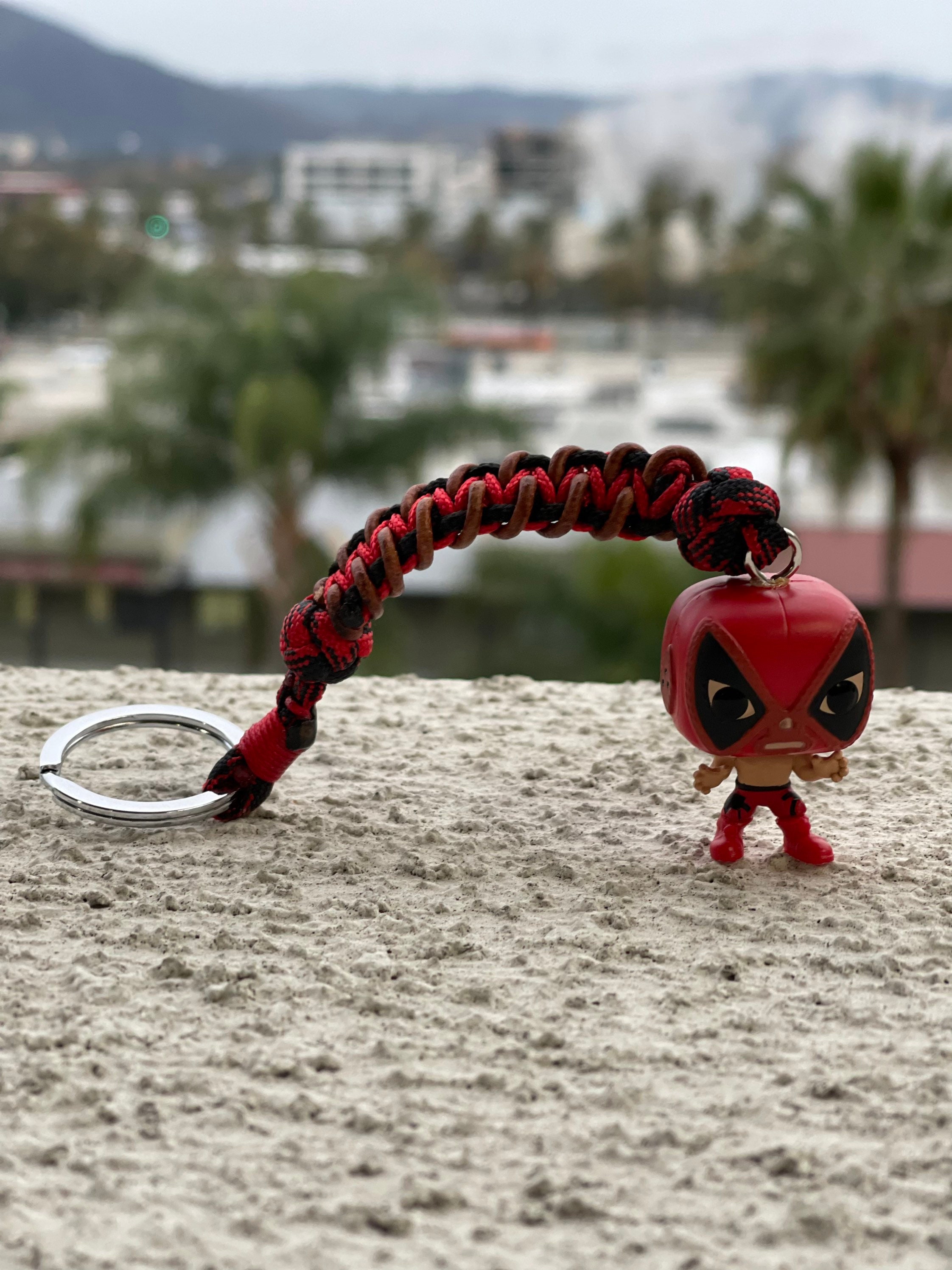 Deadpool Inspired Paracord Bracelet with Glow-In-the-Dark Eyes | High  Caliber Creations