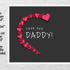 May include: A printable card with a black background and a heart shape made of pink hearts. The text "LOVE YOU DADDY!" is written in white inside the heart.