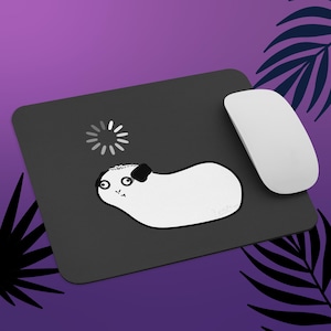 May include: A white ceramic mug with a black handle and the text "But First, Coffee" in a handwritten style. The mug is on a white surface. The mug is 4 inches tall.