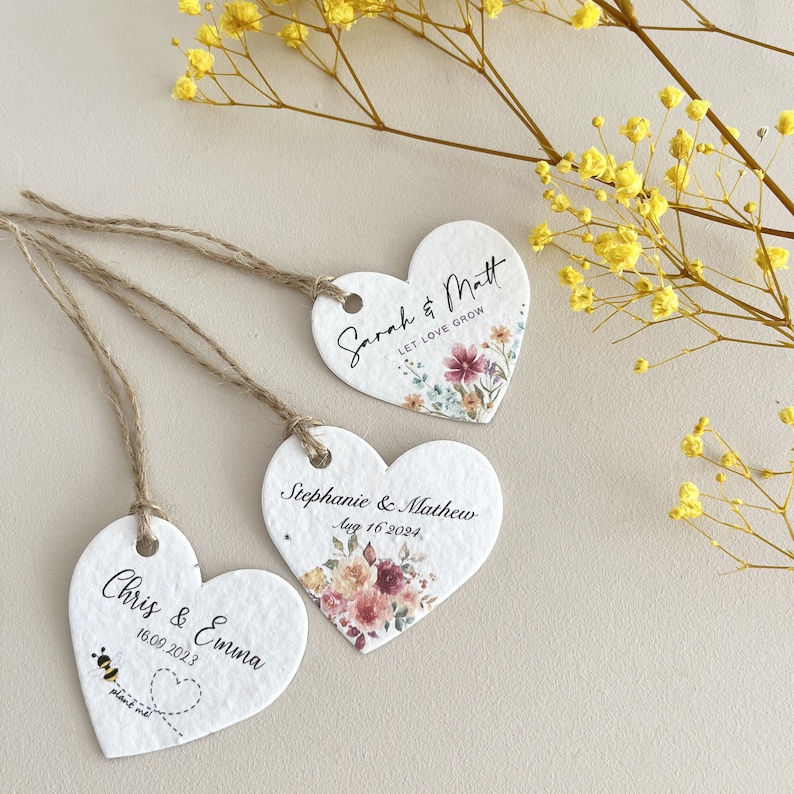 punched hole hearts with jute twine - gift labels with heart shape - wildflower seeds