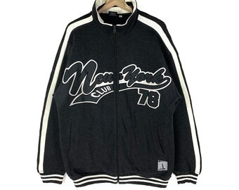 ジャケット・アウター XLARGE OG LOGO VARSITY JACKET NAVY XLARGE OG Logo Varsity Jacket in Navy | REVOLVE