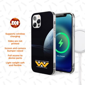 a black phone case with a space-themed design, and a smartphone displaying a full charge with a lightning bolt symbol.
