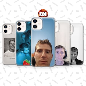 May include: Four different phone cases with various designs. One case features a photo of a young man with the text "Linus Sebastian". Another case has a blue and white design with a strawberry. The third case has a photo of a man's face. The fourth case has a photo of a man wearing headphones.