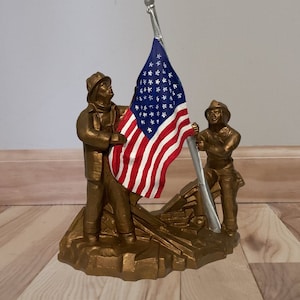Twin Towers Memorial Fireman Figurine - Remembering September 11, 2001