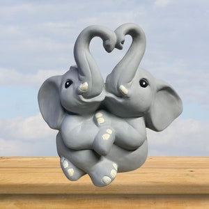 Gift-Worthy Elephant Sculpture: Ceramic Animal Art for Home Accent