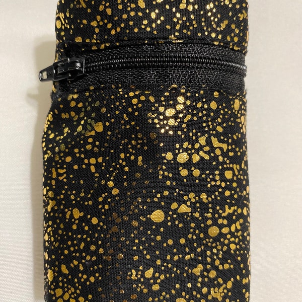 Wrist wallet in black w/gold paint splatter