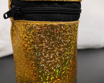 Wrist wallet in black and gold
