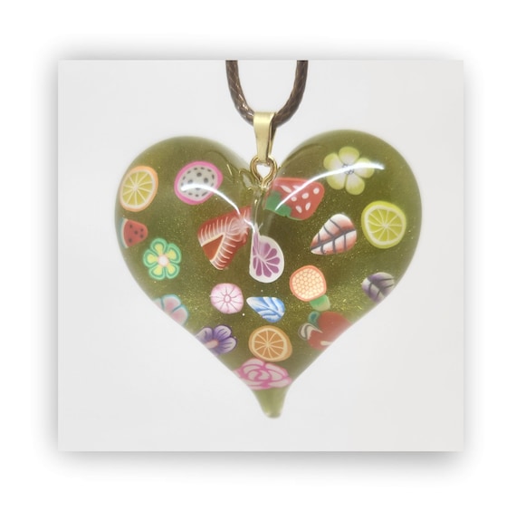 Handmade jewelry heart shape resin artistic necklace.