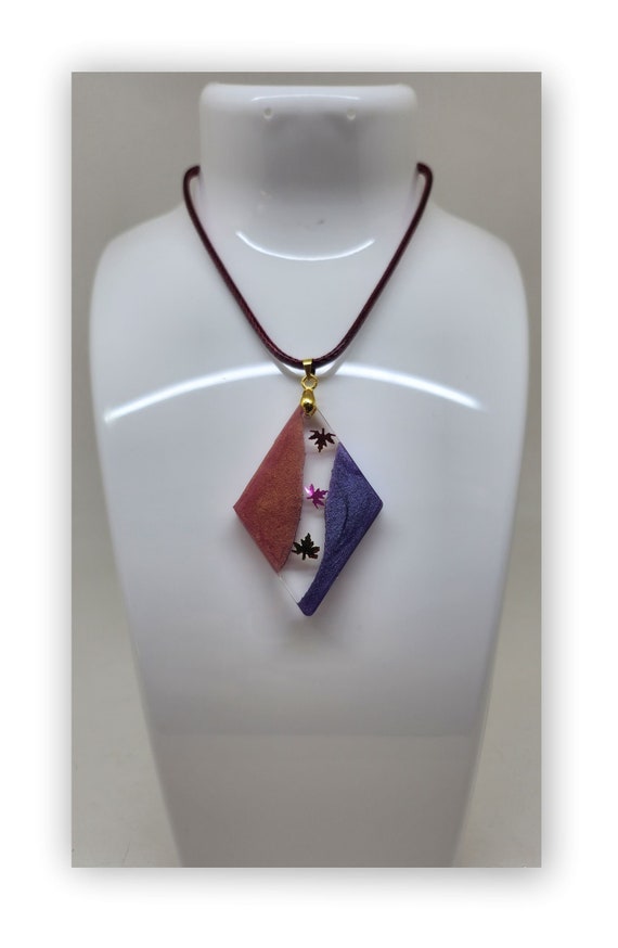 Handmade resin artistic necklace.