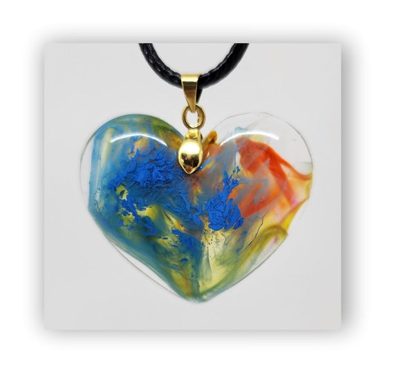 Handmade resin artistic heart shape necklace.