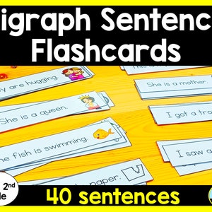 May include: A set of 40 colourful flashcards with sentences featuring digraphs. The flashcards are designed for kindergarten, first, and second grade students. The text on the flashcards includes sentences like "They are hugging." and "She is a queen."