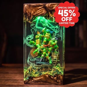 May include: A rectangular resin lamp featuring four Teenage Mutant Ninja Turtles figurines inside, illuminated by a green glow with swirling smoke effects. The base and top are brown, and a red circular badge displays "SPECIAL OFFER! 45% OFF LIMITED TIME".