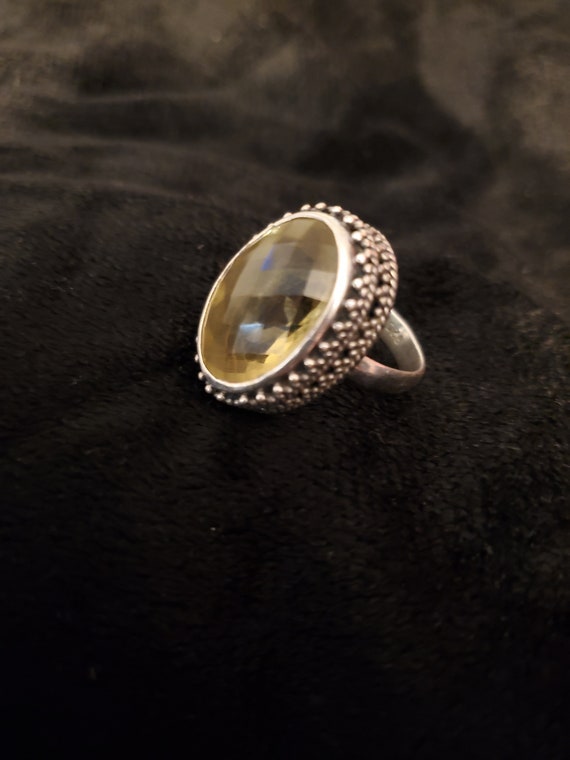 Silver ring with gemstone