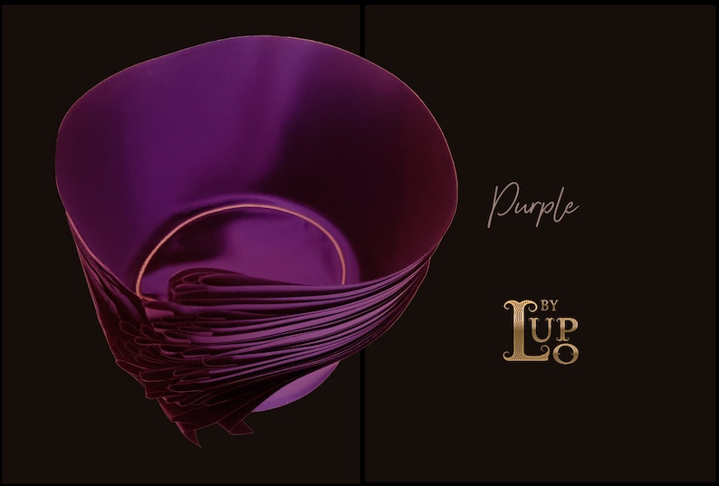 May include: A deep purple bowl with a smooth, curved interior and a layered, pleated exterior design. The text "Purple" is written in a script font above the gold-colored logo "L BY LUPO" on the right side of the dark background.