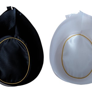 May include: Two hats, one black and one white, each featuring a rounded crown with a gold-colored trim border. The hats have a distinct, tall, pointed back section and a smooth, satin-like finish on the top surface, presented against a white background.