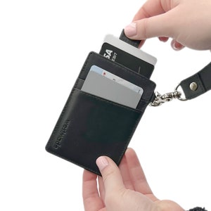 Tarjetero minimalista WESTMADE Mayfield Mini, billetera fina de cuero de primera calidad con tirador y correa para la muñeca, protección RFID, color negro grafito