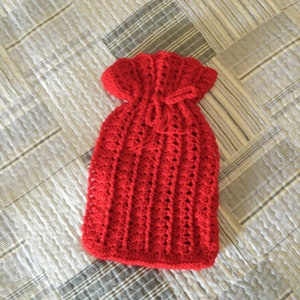Hot Water Bottle Cover Handmade Crochet in red and fits a 2 l hot water bottle