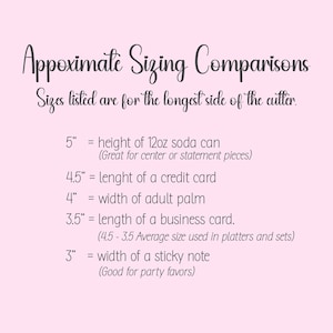 May include: A pink graphic with the text "Approximate Sizing Comparisons." It lists size comparisons: 5" is the height of a 12oz soda can, 4.5" is the length of a credit card, 4" is the width of an adult palm, 3.5" is the length of a business card, and 3" is the width of a sticky note.