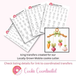 May include: Four sheets of white icing transfer paper with various vegetable designs, including carrots, radishes, and garlic. A watercolor illustration of a mobile with carrots, radishes, and garlic hangs below. Text reads "Cookie Coordinated."