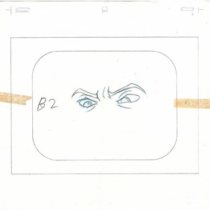 Puede incluir: Una celda de animaci&oacute;n dibujada a mano que presenta un primer plano de los ojos de un personaje. Los ojos est&aacute;n dibujados con l&aacute;piz azul, con el ce&ntilde;o fruncido, transmitiendo una expresi&oacute;n intensa o enojada. La celda est&aacute; marcada con el n&uacute;mero "B2".