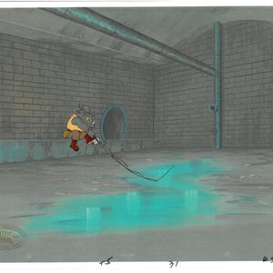 May include: Animation cel of a rhino-like character in a sewer setting. The character, wearing a yellow vest and red boots, is holding a tool with a wire. The scene features brick walls, a blue puddle, and a pipe.