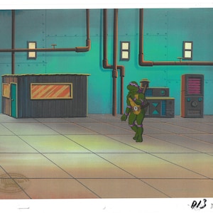 May include: A green cartoon character with a purple bandana and a weapon stands in a room with a teal wall and a brown door. The room has a tiled floor and a metal pipe system on the wall.