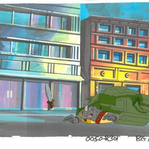 May include: Animation cel featuring a rhino-like character in a green vehicle, lying on the ground in front of buildings. The rhino has a red collar and yellow belly. A sword is stuck in the building. The buildings are colorful.