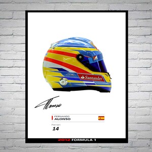 May include: A framed poster featuring a Formula 1 racing helmet. The helmet is primarily yellow, blue, and red, with the 'Santander' logo. Below the helmet are the name 'Fernando Alonso', the number '14', and the text '2012 Formula 1'.