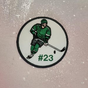 Patch Klettie 11 cm Joueur de hockey sur glace pour aimant pour rabat cartable vert blanc application cône d'école inscription scolaire robe de fée design