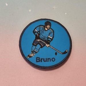 Patch Klettie 11 cm Joueur de hockey sur glace pour aimant pour rabat cartable vert blanc application cône d'école inscription scolaire robe de fée design