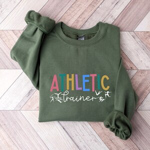 Athletic Trainer Sweatshirt, Athletic Trainer Hoodie, Gym Training, Athlete Gifts, Personal Trainer, Sports Med, AT Long Sleeve, RZ528