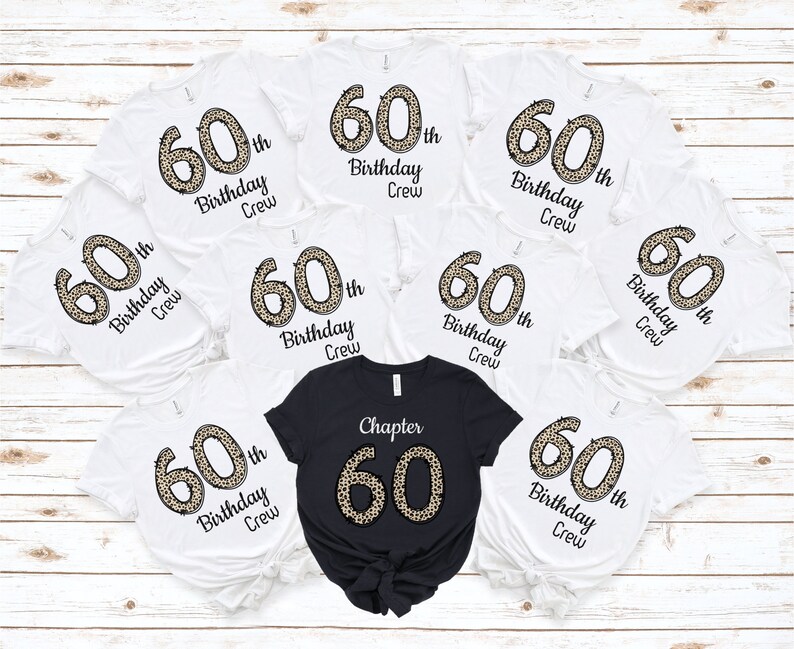 May include: Eight white t-shirts with a leopard print 60th birthday design and the text "60th Birthday Crew". One black t-shirt with a leopard print 60 and the text "Chapter 60".