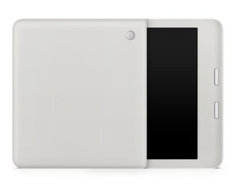 May include: A white tablet computer with a black screen. The tablet is closed and the back is visible. The back has a small camera lens in the top right corner.