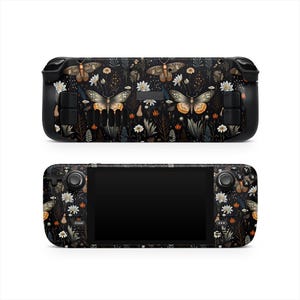May include: A black and white Nintendo Switch console skin with a floral and butterfly design. The skin features a dark background with white flowers, green leaves, and orange butterflies.