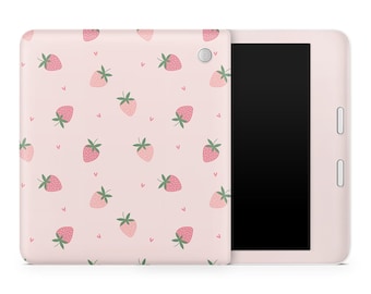 May include: A pink tablet case with a pattern of red strawberries and white hearts. The case is shown on a white background.